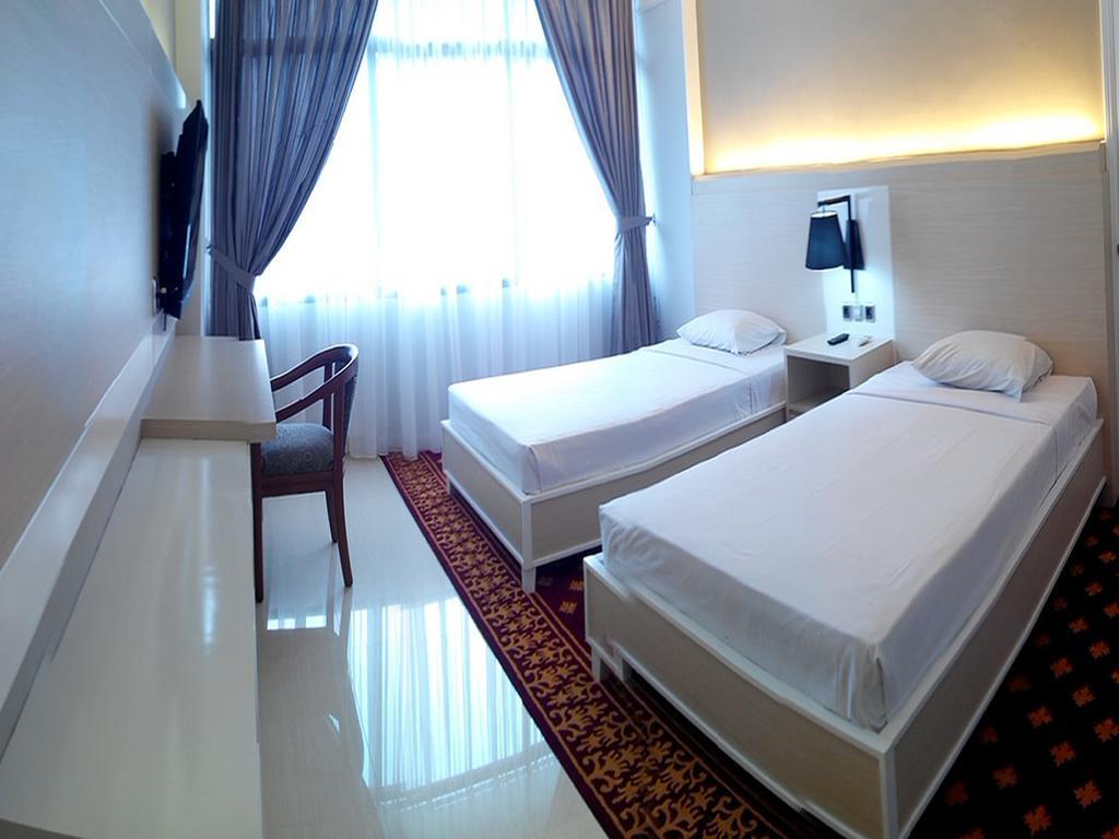 Hotel Sandjaja Palembang Habitación foto